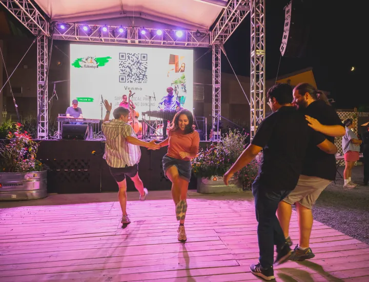 Swing dancers dance to live jazz music at Spruce Street Harbor Park