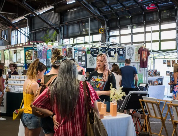 Vendor selling art at Cherry Street Pier