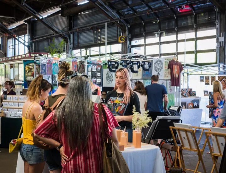 Vendor selling art at Cherry Street Pier