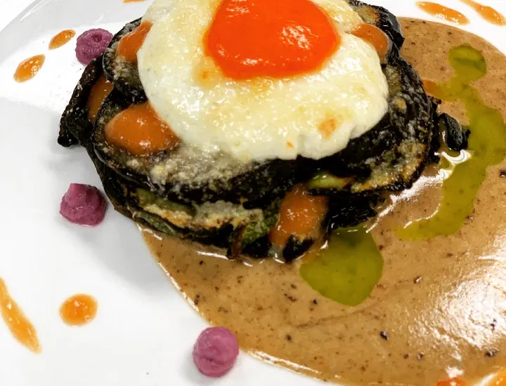 Grilled portobello and zucchini topped with parmesan and goat cheese 