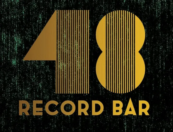 A logo for 48 Record Bar featuring gold letters on a black background