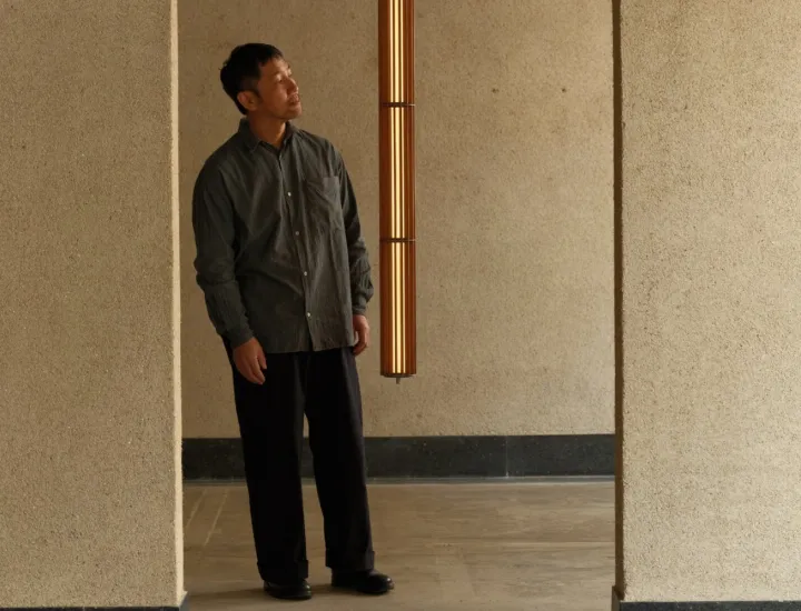 Man looking into mirror