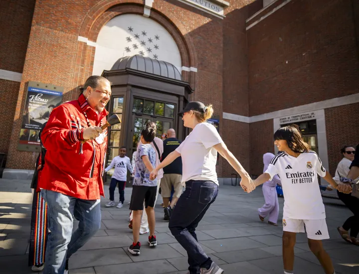 People dancing in a circle
