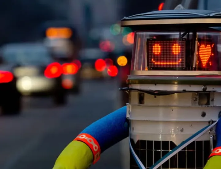 A photo of the robot known as hitchBOT waiting for a ride
