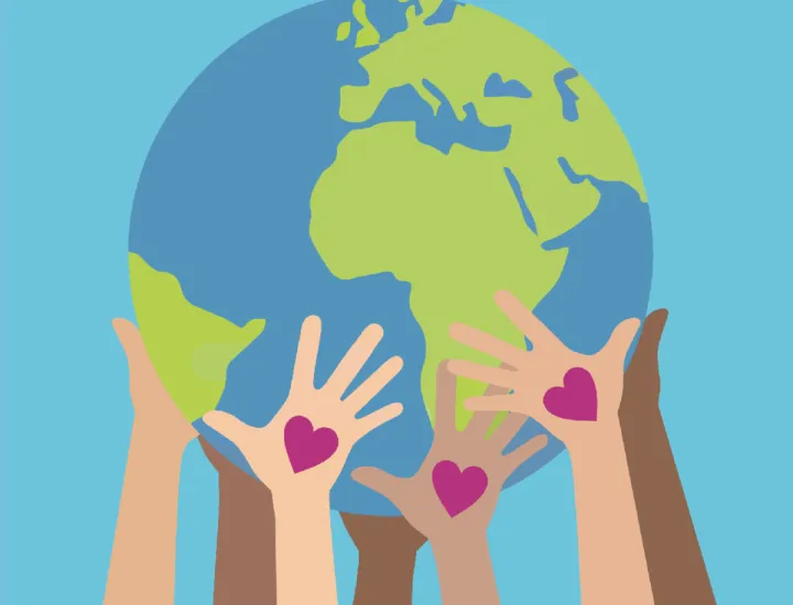 Hand holding the world with hearts 